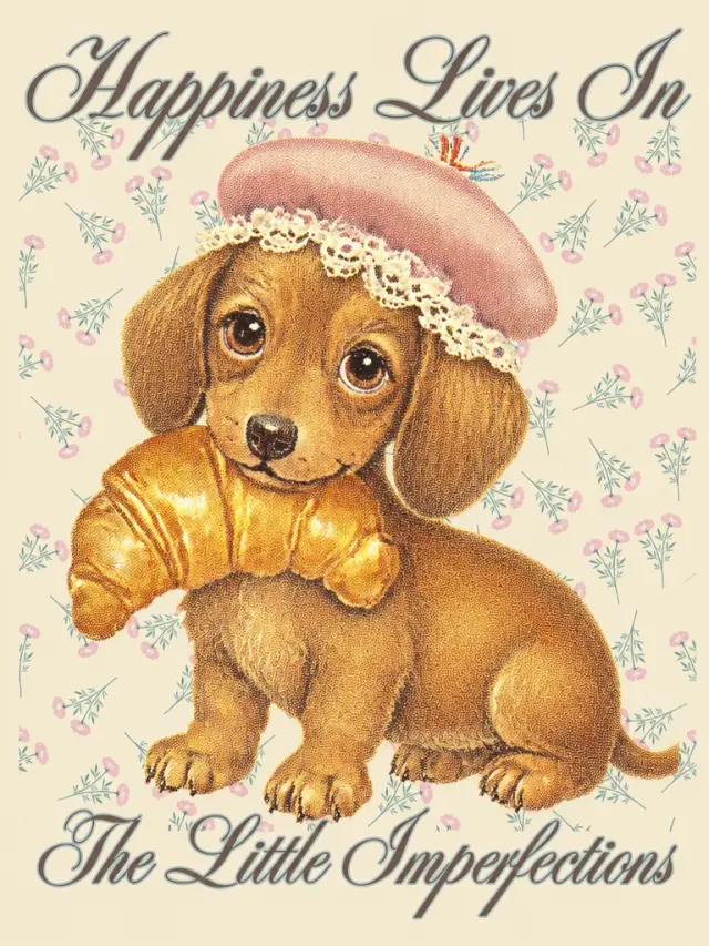 长耳幼犬戴贝雷帽抱可颂